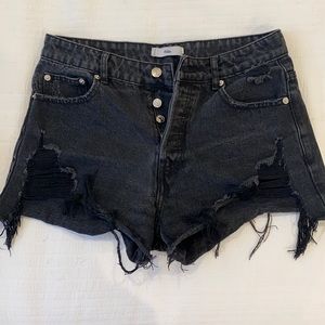 Distressed black shorts